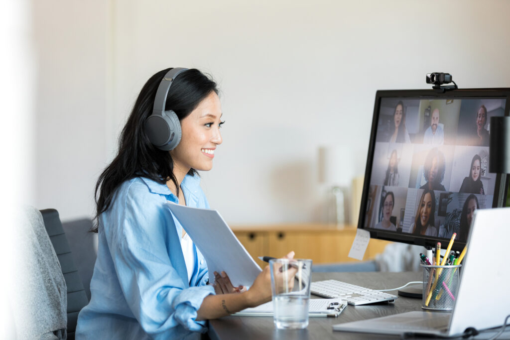 smiles during a virtual meeting