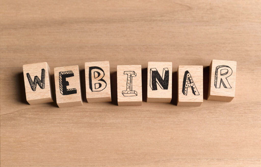 Wooden blocks spelling out the word webinar