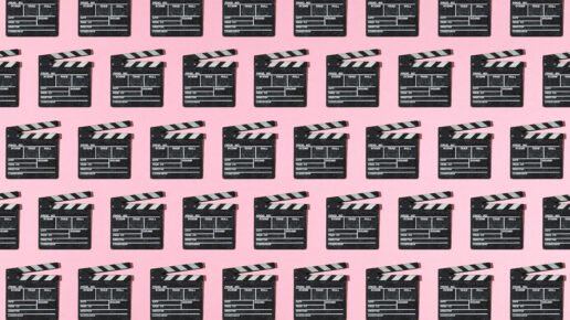 Wooden old movie clapperboard pattern with hard shadow on pink background. Concept of film industry, cinema, entertainment, and Hollywood.