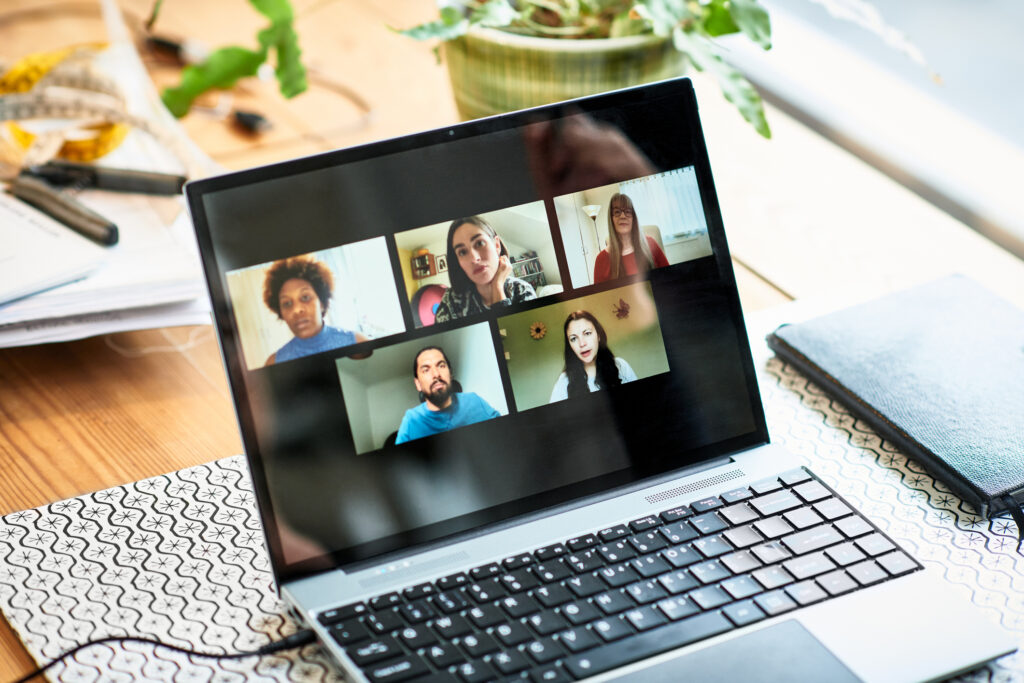 Close up of laptop participants on video conference, virtual team meeting, colleagues