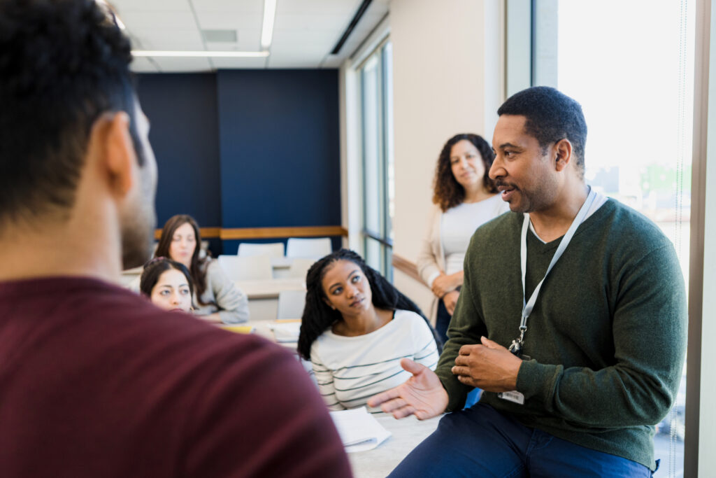 The class tutor uses storytelling to engage students.