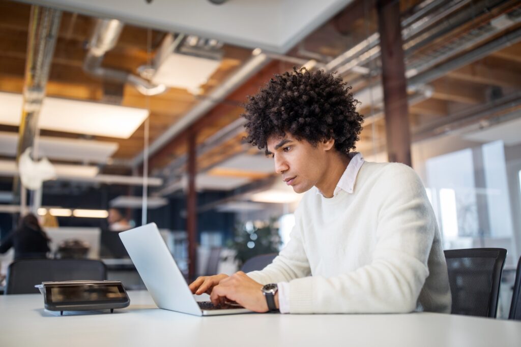 A man working on his business proposal presentation.