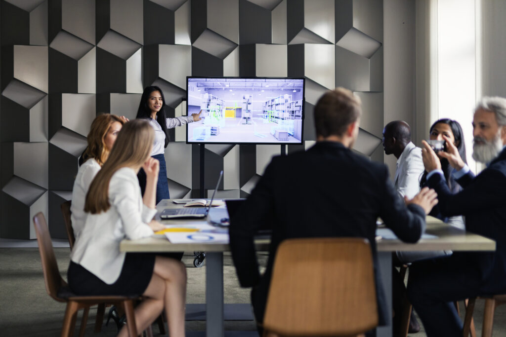 Business people attending an artificial intelligence presentation.